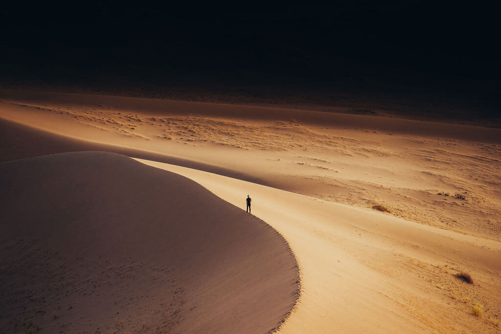 Luke Stackpoole - Man Walking in the Dessert